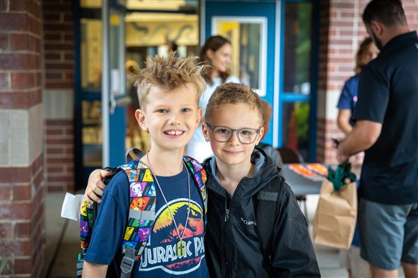 two boys in front of WGES